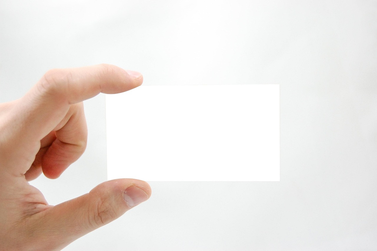 Business card, business, hand — The Evolution of MREs: From Military Rations to Outdoor Essentials