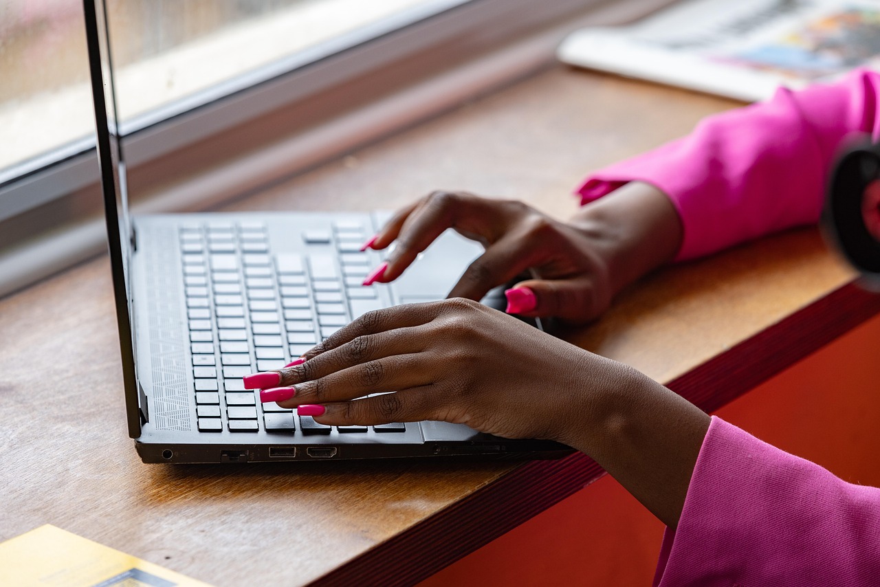 Laptop, typing, working — Where to Buy THC in Germany: A Comprehensive Guide